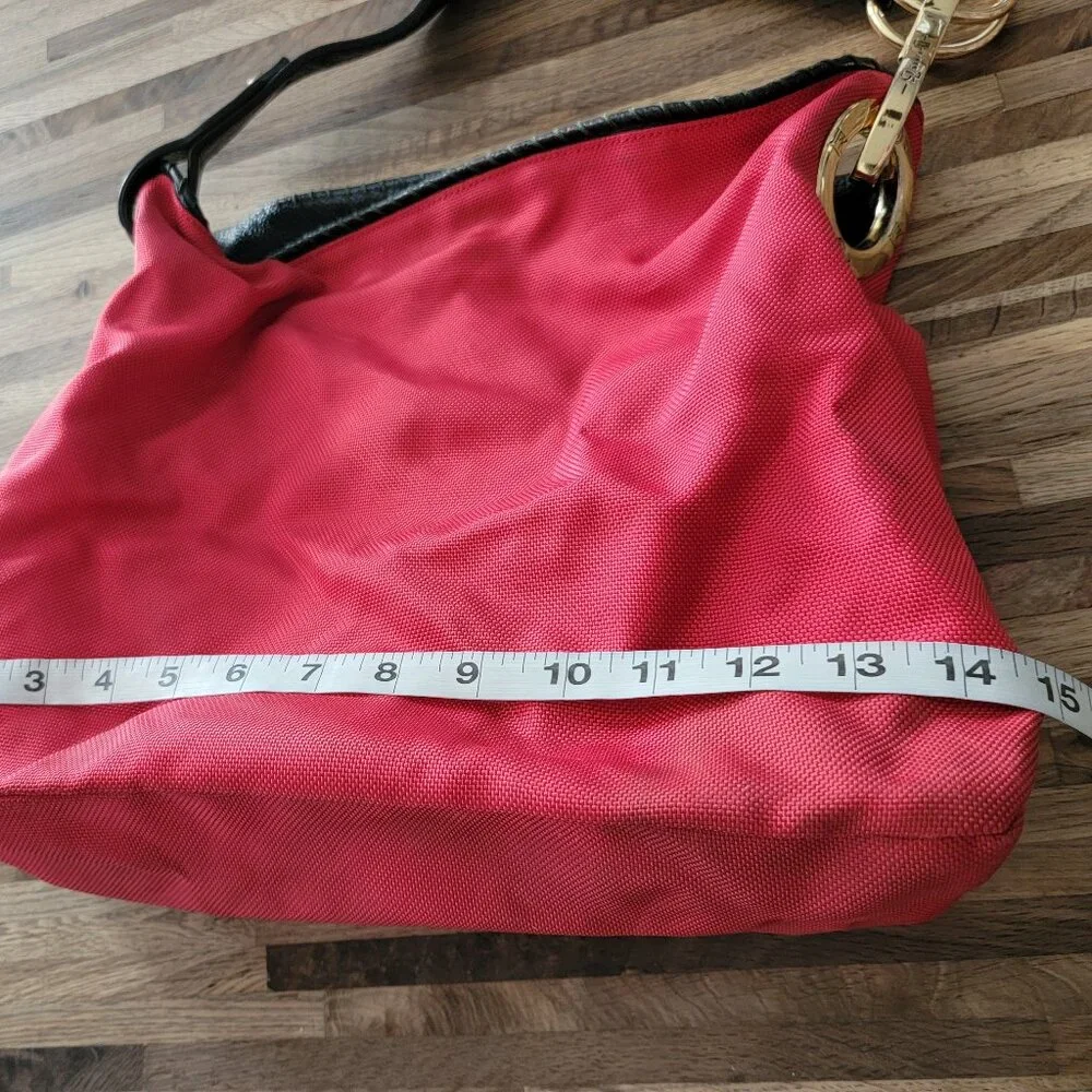 JPK Paris 75 hobo bucket shoulder bag in red nylon with a floral lining
